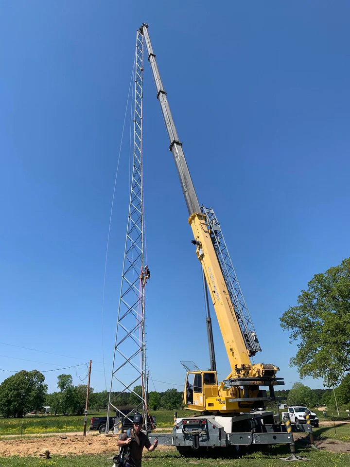 Vertical Axis climber at height on a tower build