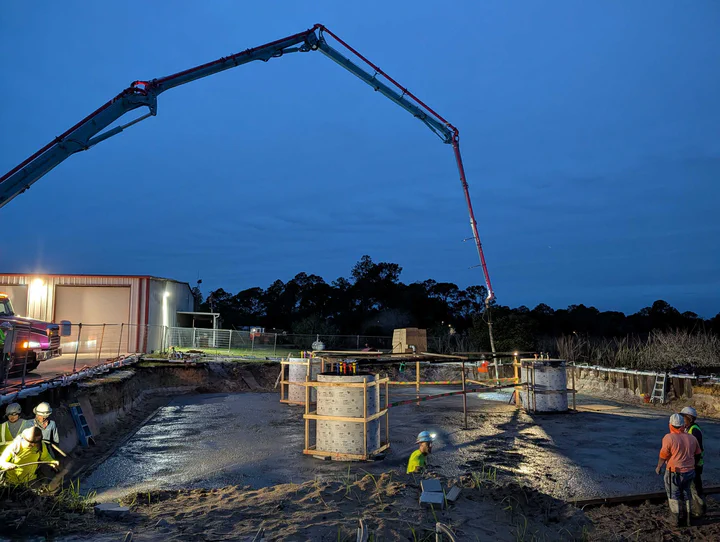 Utility communications tower next to an energized substation with ground grid tie-in