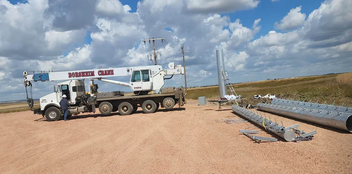 Licensed microwave dish installed for a utility teleprotection path