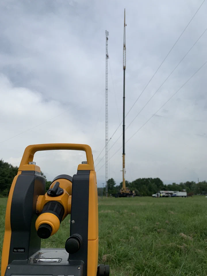 Load cell rigged inline on a guy wire during re-tensioning