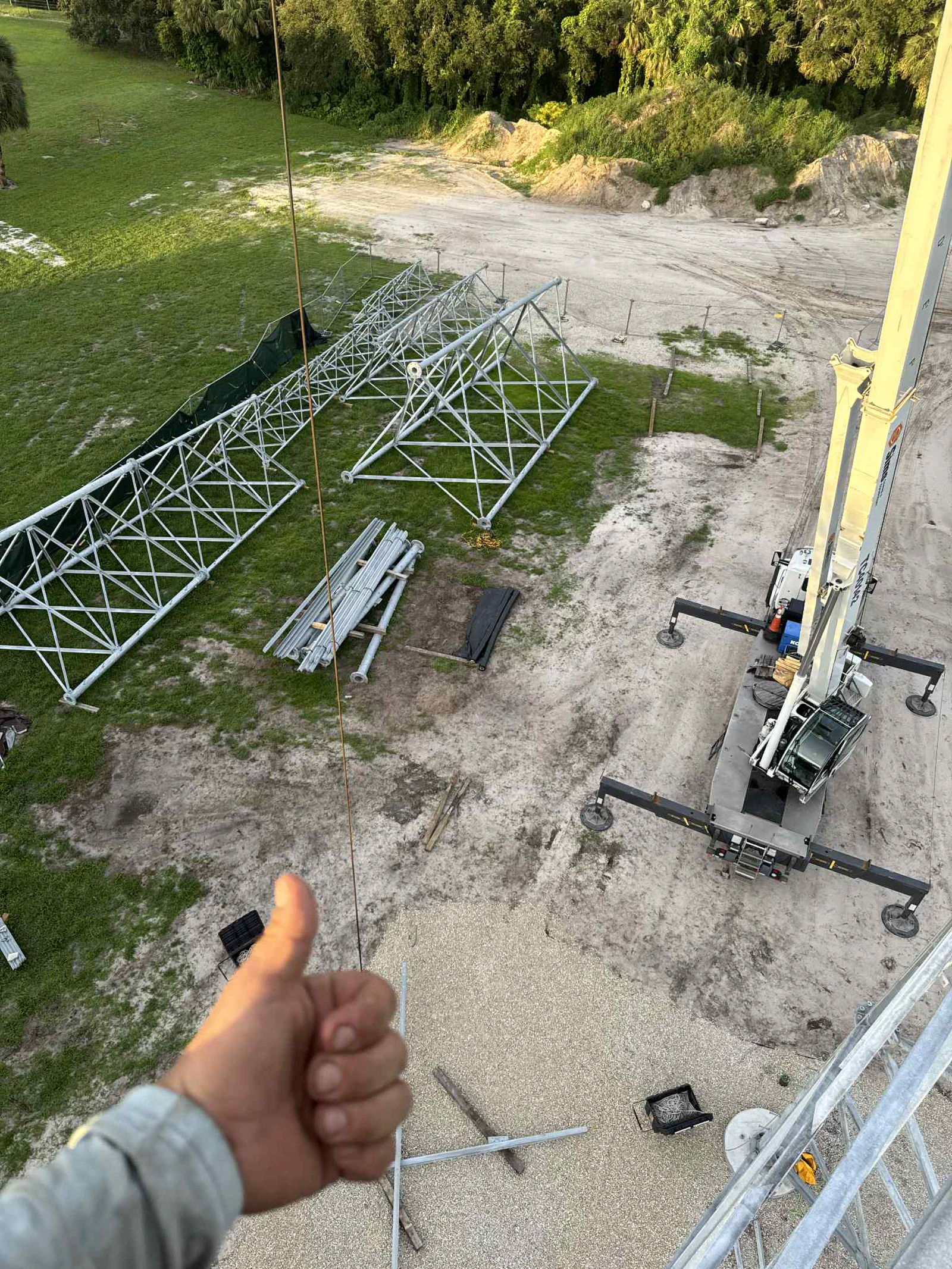 Vertical Axis climber working an emergency tower response at dusk